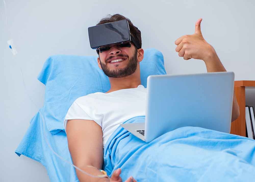 Reducing depression with AR/VR technology: happy patient in the hospital with VR glasses headset